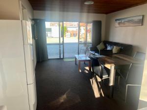 Kuchyň nebo kuchyňský kout v ubytování Pinewood Motels