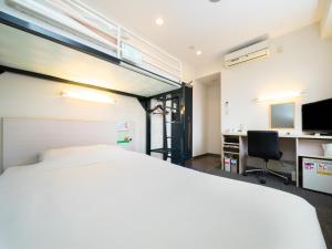 Televiisor ja/või meelelahutuskeskus majutusasutuses Super Hotel Tokyo Kameido
