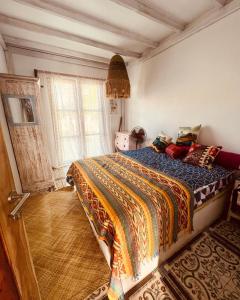 Кровать или кровати в номере Rote Happy House