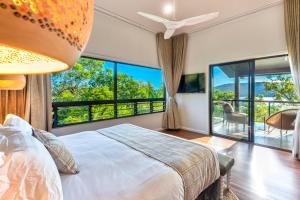 Postel nebo postele na pokoji v ubytování Point Blue on Hamilton Island by HIHA + 24 fotografií