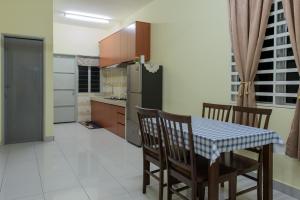 Kuchyň nebo kuchyňský kout v ubytování Zai Ham Homestay