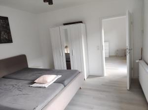 Postel nebo postele na pokoji v ubytování Ferienwohnung Lange