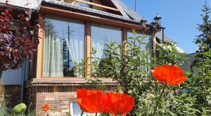 Φωτογραφία από το άλμπουμ του "PRZY PARKU" Dom nad morzem z werandą i ogrodem σε Stegna