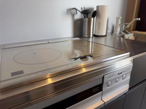 Een keuken of kitchenette bij SETO CLAS AJI THE SEASIDE HILLS RESORT