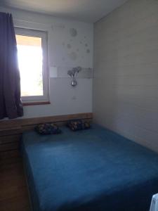 Posteľ alebo postele v izbe v ubytovaní Charmant logement sur la station de Val Louron
