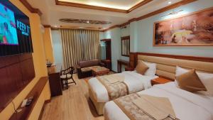 Letto o letti in una camera di Sherpa Home Hotel