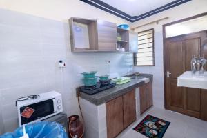 Eldhús eða eldhúskrókur á Jovial home +8 myndir