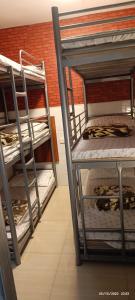 Letto o letti in una camera di The Cultural Crashpad - 康乃馨旅館