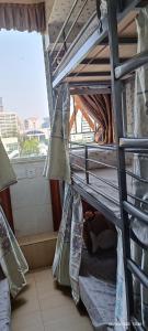 Letto o letti in una camera di The Cultural Crashpad - 康乃馨旅館