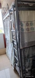 Letto o letti in una camera di The Cultural Crashpad - 康乃馨旅館