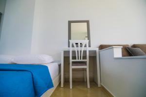 Postel nebo postele na pokoji v ubytování Vila Enxhi