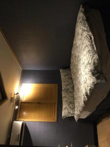 Ένα ή περισσότερα κρεβάτια σε δωμάτιο στο G Mini Hotel Dongdaemun