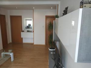 a living room with a staircase and a hallway at Bedroom to rent in the beach in Valencia