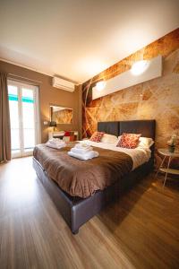 a bedroom with a large bed in a room at Hotel Sereno in Sestri Levante