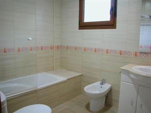 Łazienka w obiekcie Sanxenxorural - Apartamentos La Rana