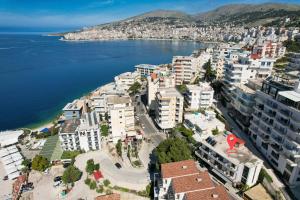 an aerial view of a city next to the water at Hotel Argjiro in Sarandë