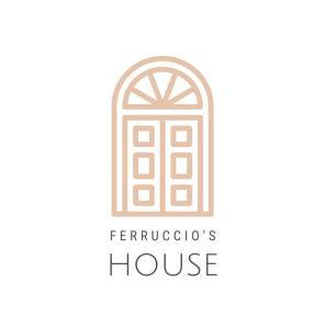 um logótipo para uma casa com janela em Ferruccio's House em Colonnella