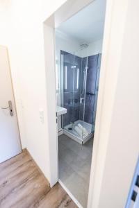 Koupelna v ubytování Hökis-Zimmervermietung 1 + 10 fotografií