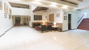 Χώρος καθιστικού στο El Rico Suite Makati by RedDoorz