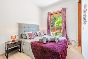 Posteľ alebo postele v izbe v ubytovaní Villa Sa Olivera
