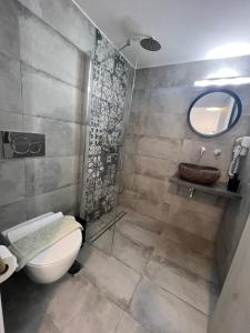 Koupelna v ubytování Christos rooms milos