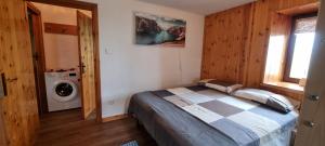 En eller flere senge i et værelse på La Maison de Vetan