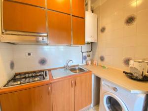 Kuchyň nebo kuchyňský kout v ubytování Imperiale Apartment