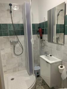 a bathroom with a shower and a toilet and a sink at Home SEA&DREAMS OldTown V in Calpe