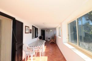 A bed or beds in a room at Trullo - Cantoru by LoveSud