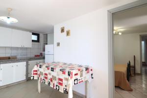 A kitchen or kitchenette at Trullo - Cantoru by LoveSud