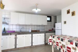 A kitchen or kitchenette at Trullo - Cantoru by LoveSud