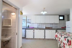 A kitchen or kitchenette at Trullo - Cantoru by LoveSud