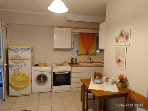 A kitchen or kitchenette at La Playa 2