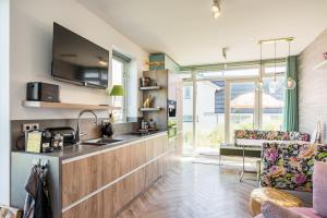 Η κουζίνα ή μικρή κουζίνα στο Beach house Alba