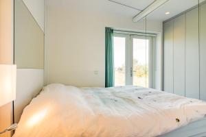Ένα ή περισσότερα κρεβάτια σε δωμάτιο στο Beach house Alba