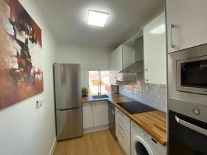 Kuchyň nebo kuchyňský kout v ubytování Apartamento Céntrico-parking gratuito-Wifi + 17 fotografií