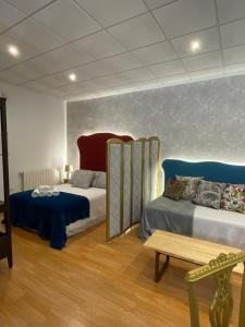 Posteľ alebo postele v izbe v ubytovaní ATENEO LOFT LUXURY Apartamento de 70 metros