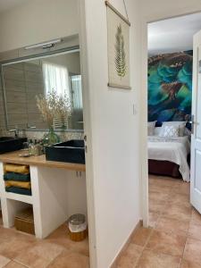 Postel nebo postele na pokoji v ubytování Les Jardins d'Holi proche Uzès