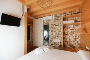 TV a/nebo společenská místnost v ubytování B&B Sant Pol - Adults Only