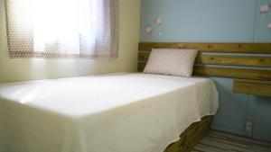 Cama o camas de una habitación en Camping Miramar