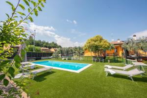 The swimming pool at or close to Villa Teresa Apt Lake Garda View - Happy Rentals