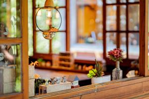 Postelja oz. postelje v sobi nastanitve 南庄橄欖樹咖啡民宿 Olive Tree Village Guesthouse