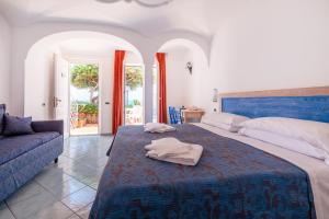 Postel nebo postele na pokoji v ubytování Hotel Don Felipe