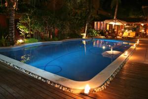 A piscina localizada em Hotel Pousada Coqueiros ou nos arredores