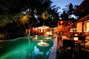 A piscina localizada em Hotel Pousada Coqueiros ou nos arredores