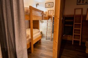 Postel nebo postele na pokoji v ubytování La Bergère