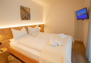 Posteľ alebo postele v izbe v ubytovaní Brenta Rosso - Charme Apartments