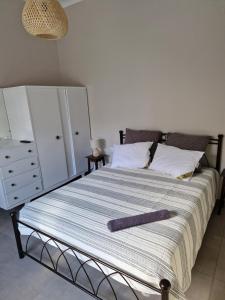 En eller flere senge i et værelse på The Garden House