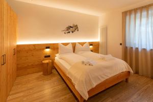 Posteľ alebo postele v izbe v ubytovaní Brenta Rosso - Charme Apartments