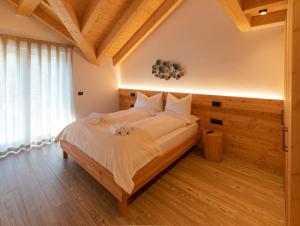 Posteľ alebo postele v izbe v ubytovaní Brenta Rosso - Charme Apartments